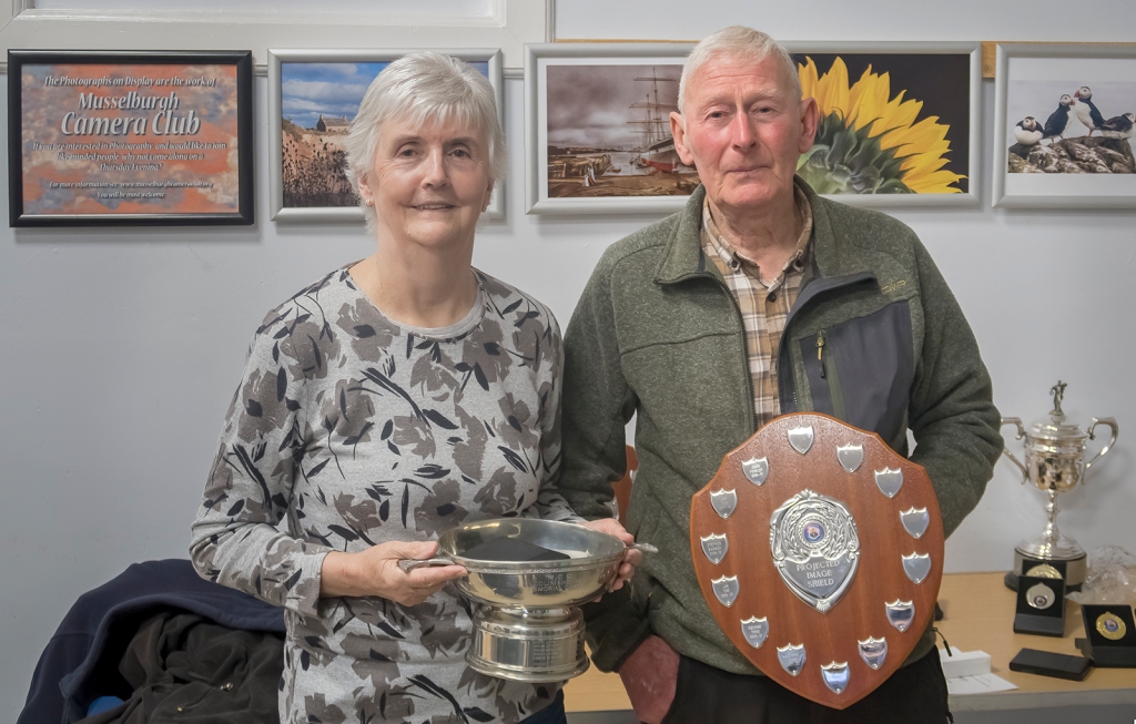Jennifer Davidson and Joe Fowler receive their trophies at the 2024 AGM.